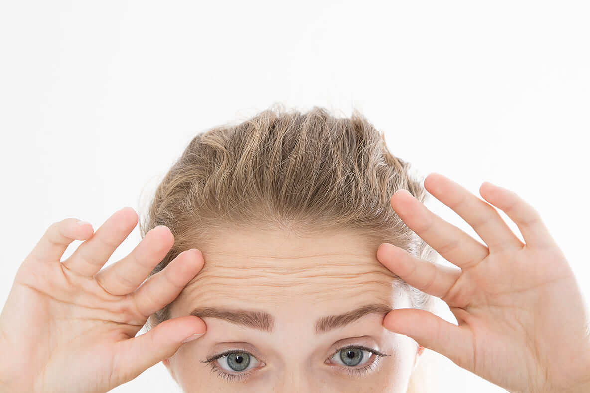 Wie kann man sich das Stirnrunzeln abgewöhnen?